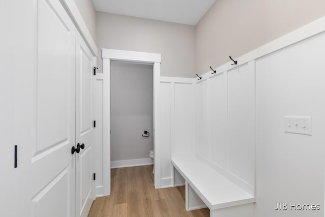 mudroom with light wood-style flooring