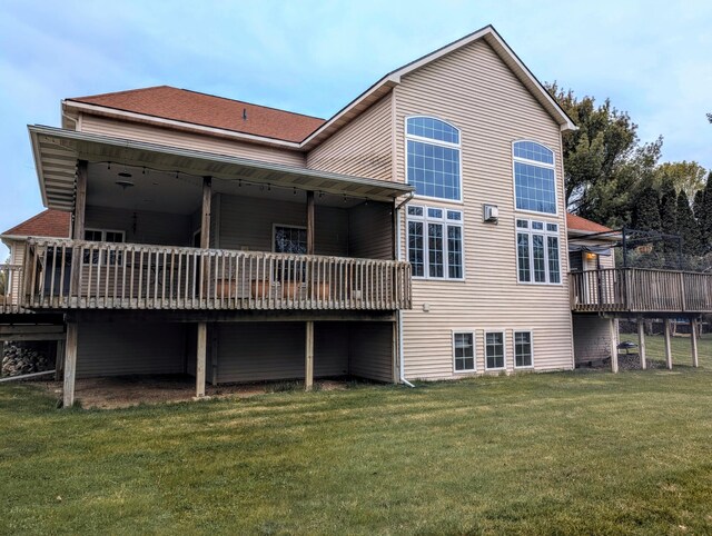 168 Pheasant Run, Battle Creek, MI 49015 - back of property with a yard and a deck
