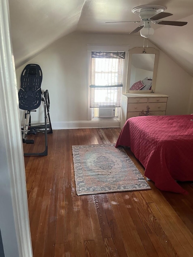 bedroom with wood-type flooring, lofted ceiling, cooling unit, and ceiling fan