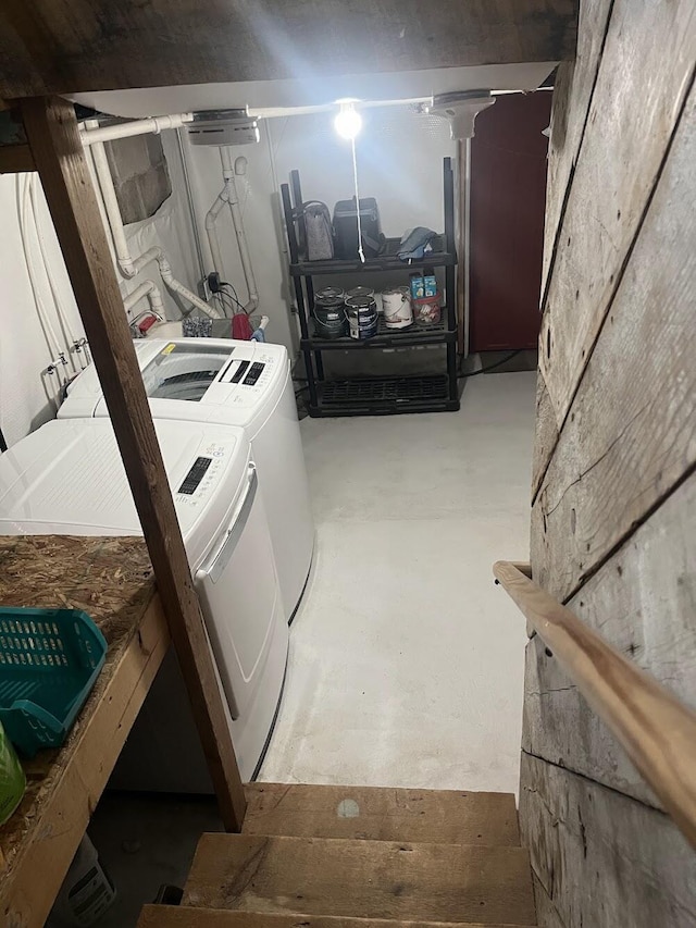 laundry room featuring washing machine and clothes dryer