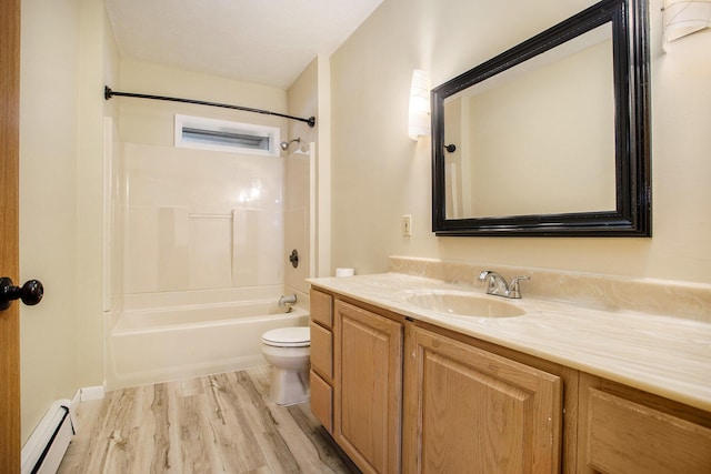 full bathroom featuring tub / shower combination, hardwood / wood-style floors, vanity, a baseboard radiator, and toilet