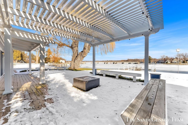 view of patio / terrace featuring a fire pit and a pergola