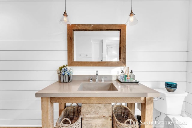 kitchen with pendant lighting and a sink