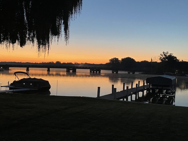 dock area featuring a water view