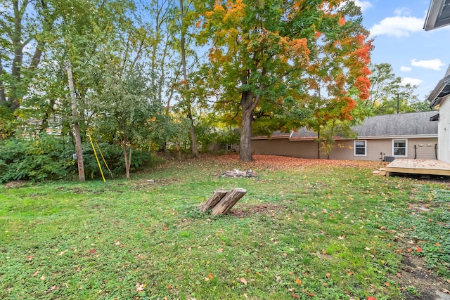 view of yard featuring a wooden deck