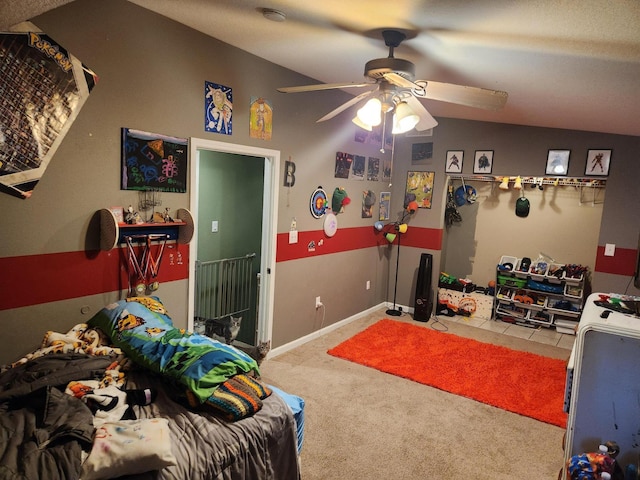 game room featuring lofted ceiling, carpet floors, and ceiling fan