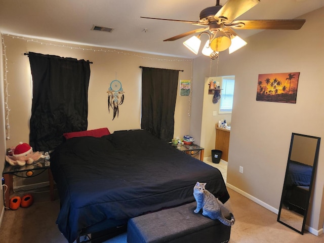 carpeted bedroom featuring ceiling fan