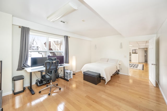 bedroom with light hardwood / wood-style flooring