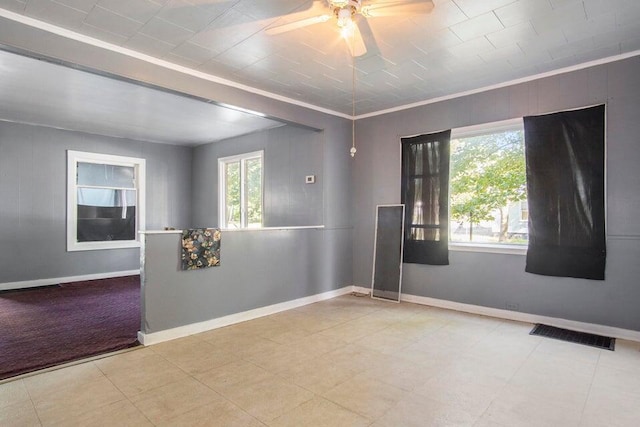 spare room with ceiling fan