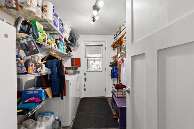 3509 N Shore Dr, Sears, MI 49679 - laundry room with carpet, laundry area, and washing machine and dryer