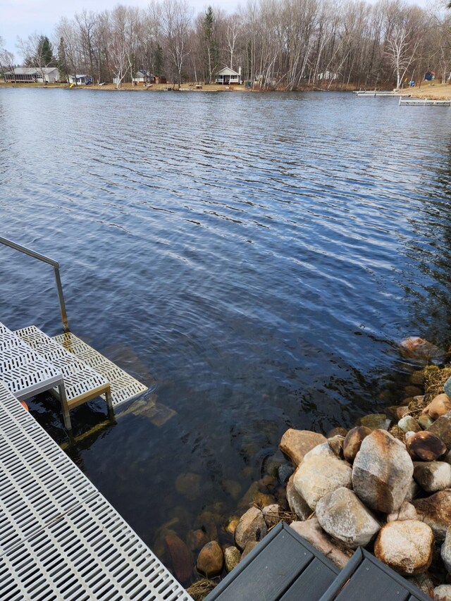 3509 N Shore Dr, Sears, MI 49679 - dock area featuring a water view