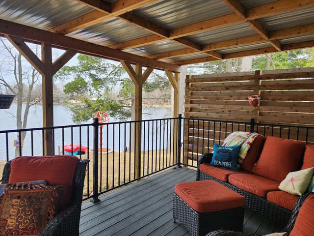 3509 N Shore Dr, Sears, MI 49679 - wooden terrace with a water view