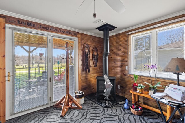 3509 N Shore Dr, Sears, MI 49679 - interior space with a wood stove