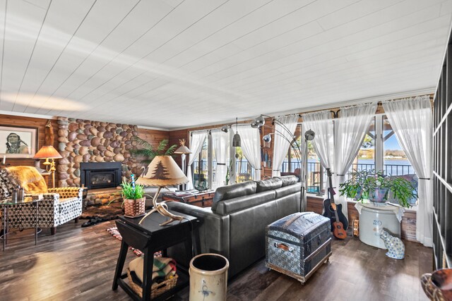 3509 N Shore Dr, Sears, MI 49679 - living room with a water view, wood finished floors, and a healthy amount of sunlight