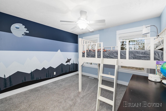 bedroom featuring ceiling fan and carpet flooring