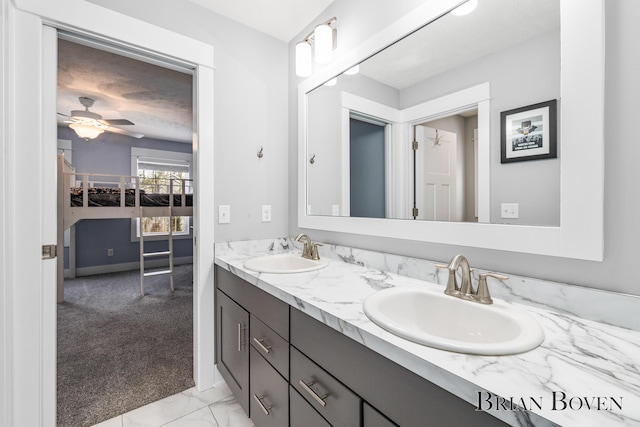 bathroom featuring vanity and ceiling fan