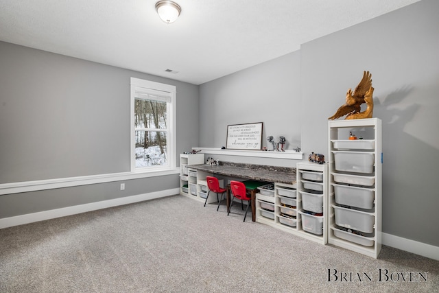 home office featuring carpet flooring