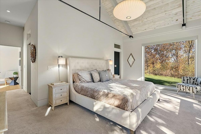 carpeted bedroom with wood ceiling, beam ceiling, high vaulted ceiling, and access to outside