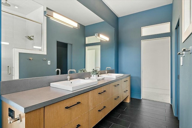 bathroom featuring vanity and walk in shower