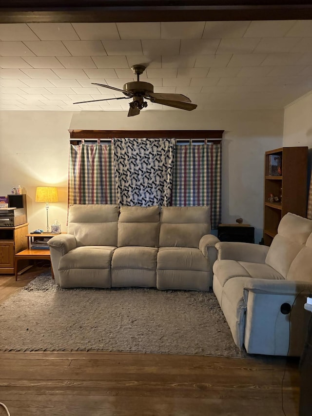 living room featuring hardwood / wood-style flooring and ceiling fan