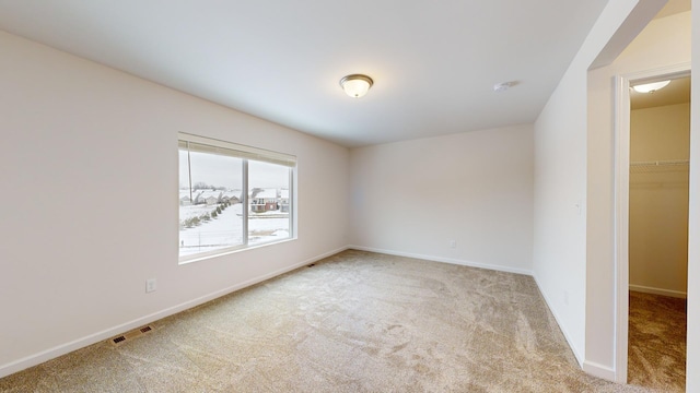 view of carpeted spare room