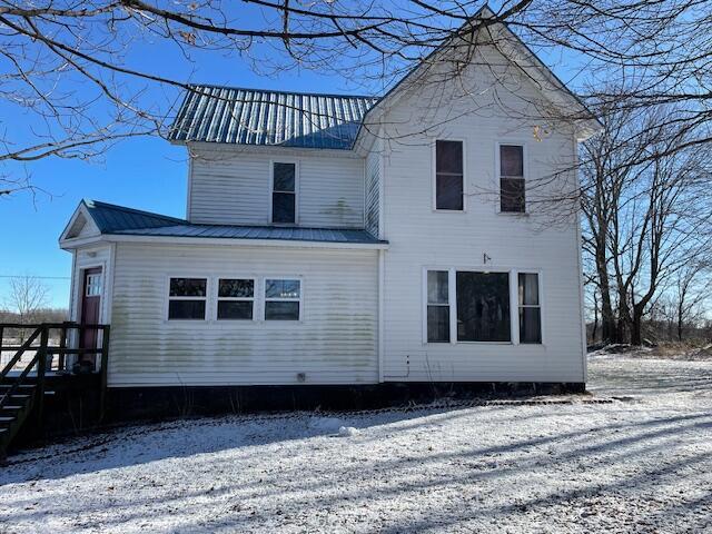 view of snow covered property