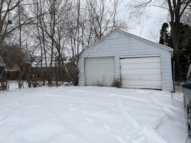 view of snow covered garage