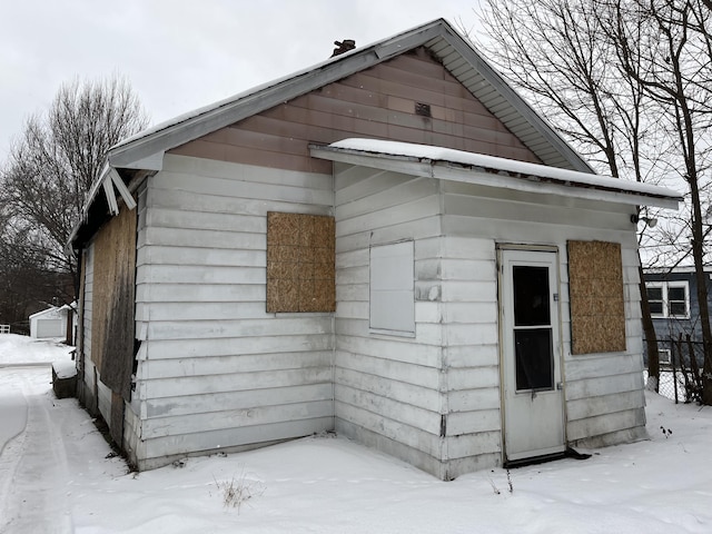 view of snow covered property