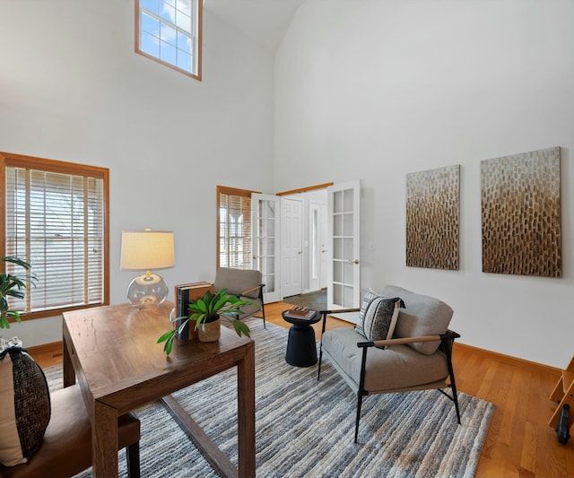 living room featuring hardwood / wood-style floors and french doors