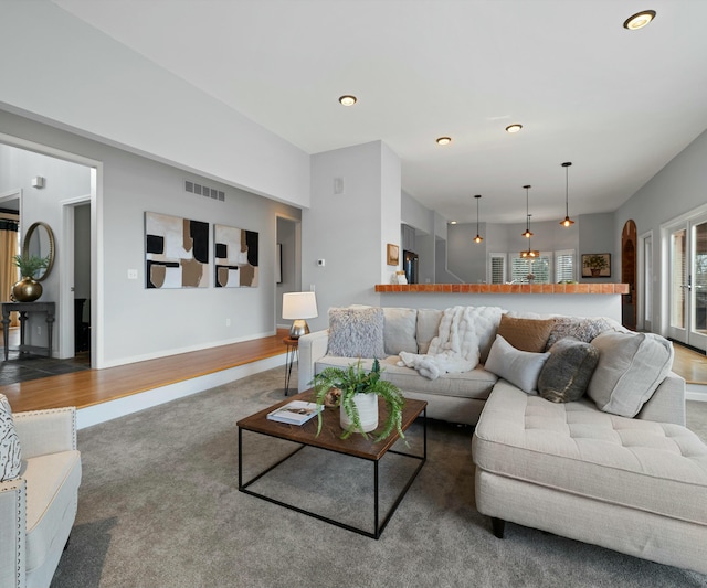 living room with dark hardwood / wood-style floors