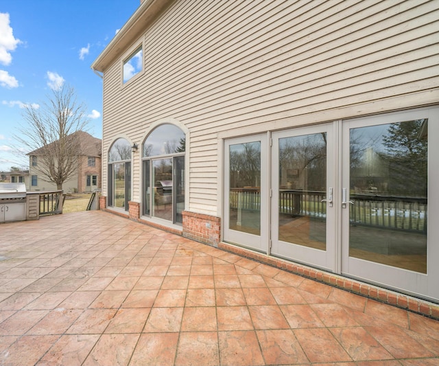 view of patio with french doors and grilling area