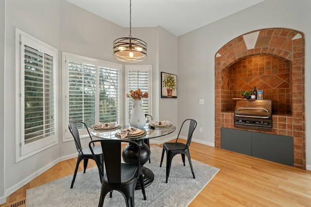 dining space featuring hardwood / wood-style floors