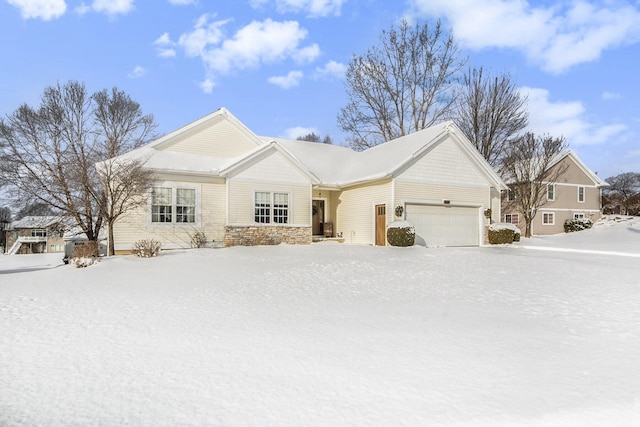 ranch-style house featuring a garage