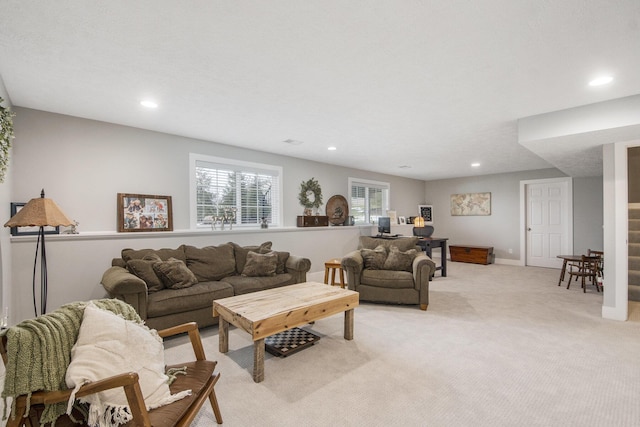 living room featuring light carpet