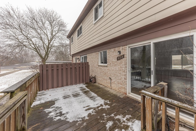 view of snow covered deck