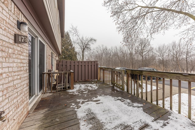 view of snow covered deck