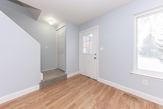 entrance foyer featuring light wood-type flooring