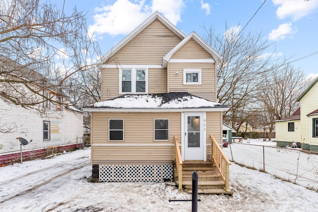 view of snow covered house