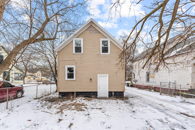 view of snow covered house