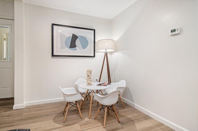 sitting room with light hardwood / wood-style floors