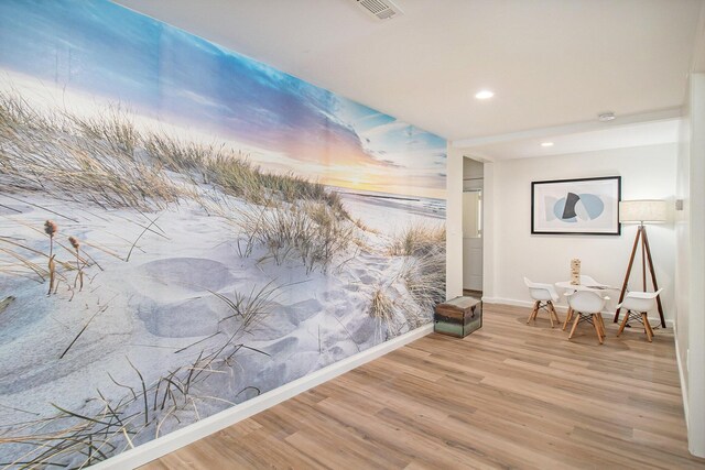 interior space with hardwood / wood-style flooring