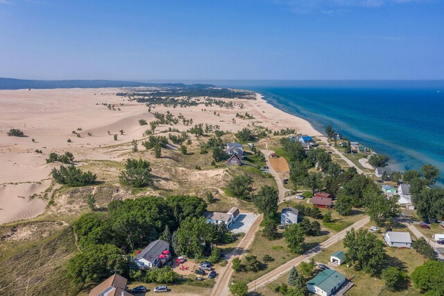 aerial view with a view of the beach and a water view