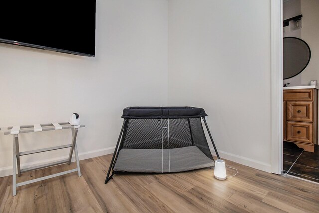 interior details featuring hardwood / wood-style flooring