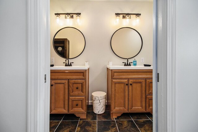 bathroom with vanity and tile patterned flooring