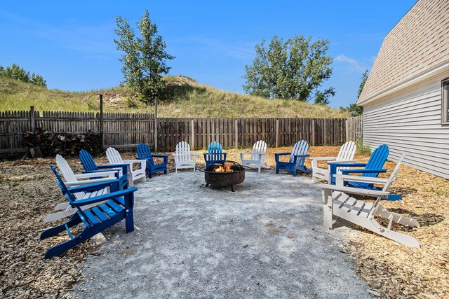 view of patio / terrace with a fire pit