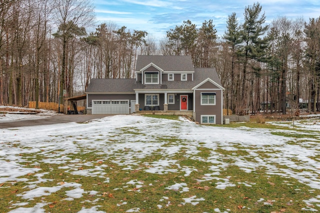 view of property with a carport and a garage