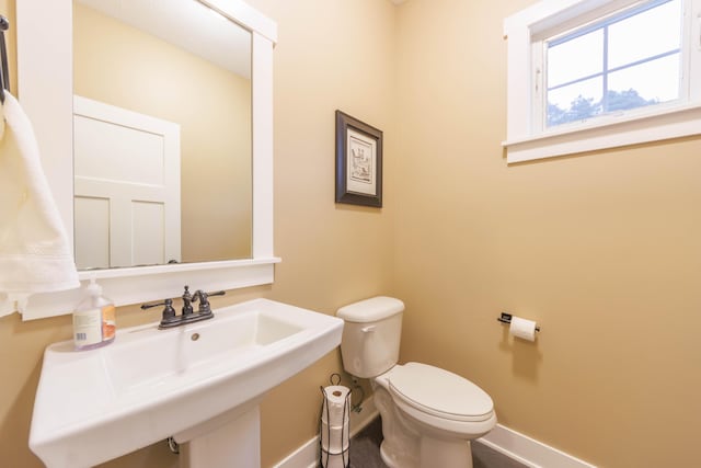 bathroom with sink and toilet