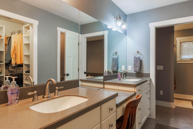 bathroom featuring vanity and tile patterned flooring