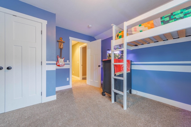 unfurnished bedroom featuring carpet