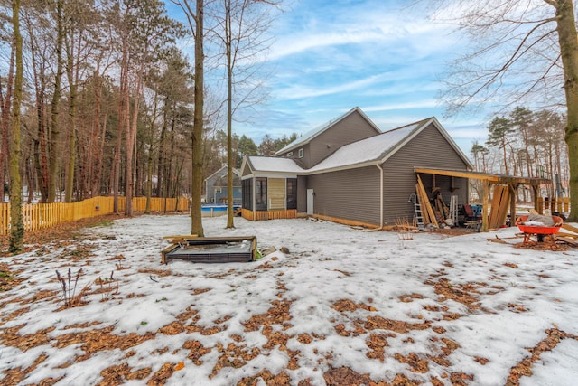 view of snow covered property